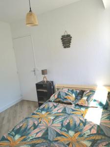 Appartements L'Ideal, plages, port, climatisation, TV : photos des chambres