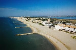 Appartements L'Ideal, plages, port, climatisation, TV : photos des chambres