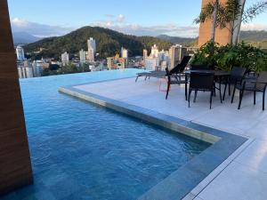 Loft em prédio com piscina próximo da Oktoberfest Blumenau