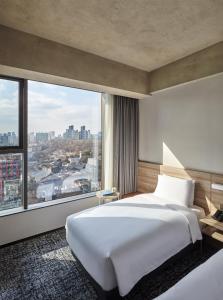 Phòng Tiêu Chuẩn Hai Giường Đơn – Nhận Phòng Muộn Lúc 7:00 Tối (Standard Twin Room - Late Check-In at 7:00 PM)