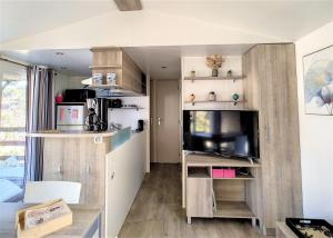 Campings Mobil Home 6/8 Places vue degagee : photos des chambres