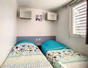 Campings Mobil Home 6/8 Places vue degagee : photos des chambres