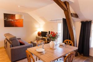 Appartements Studio confortable, parking et jardin : photos des chambres