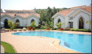 Riviera palms 1 Luxury 1 BHK apartment with Swimmimg Pool view- Arpora - near baga beach flat no 123