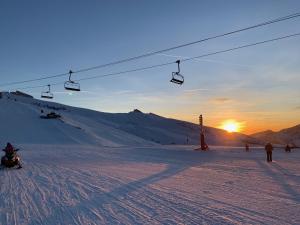 Appartements Eden sur les pistes avec vue panoramique sur la vallee : photos des chambres