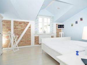 Villa "To Hus" in Sellin - Appartement 07 im DG mit Kamin und Balkon