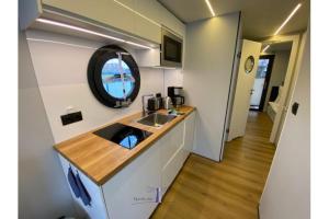 Hausboot Fjord Vela mit Biosauna in Barth