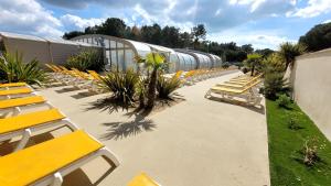 Maisons de vacances Hibiscus - Camping du Bois Masson : photos des chambres
