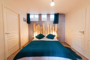 2 appartements conforts + jardin + parking : photos des chambres