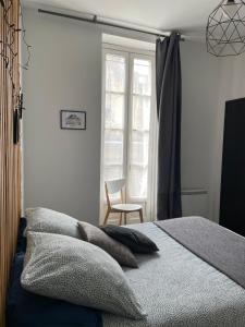 Appartements Le charmant quai bourgeois : photos des chambres