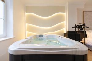 Appartements Le Reve de Stanislas - Jacuzzi : photos des chambres