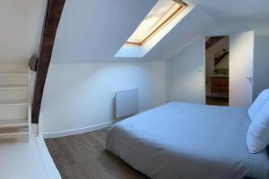 Appartements Au bord de la Mayenne : photos des chambres