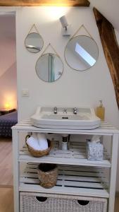 Appartements Le Petit Lavoir - Maison Cosy a Mayet : photos des chambres