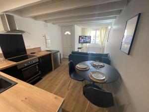 Appartements Le p tit Marin proche marche central et gare SNCF- wifi haut debit - : photos des chambres