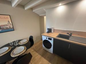 Appartements Le p tit Marin proche marche central et gare SNCF- wifi haut debit - : photos des chambres