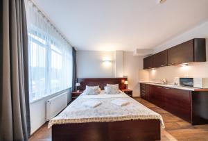 Apartamenty i pokoje ,,Leśne"