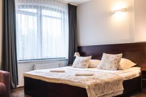 Pokoje i apartamenty ,,Leśne"