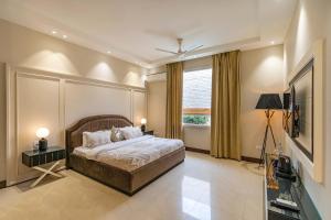 StayVista at D Amour with Breakfast, Lawn, BBQ