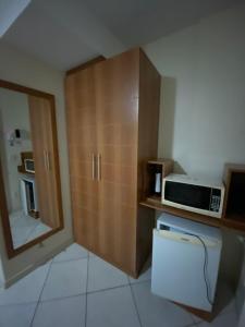 Flats próximo ao Shopping Singapura - pode descer com bebidas para o Park Aquático 1211