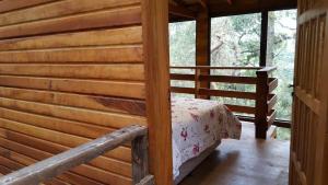 Chalé dos Tucanos- Parede de vidro com linda vista