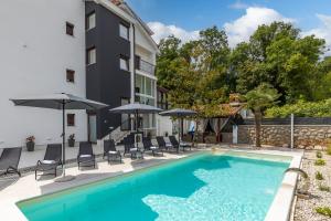 Piccola Villa Adriatic with a swimming pool, grill, children playground Opatija