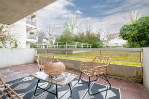 Appartements Le Lagon - Terrasse - Parking : photos des chambres