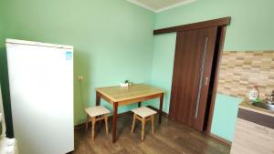 Водопійна 19 CityRooms