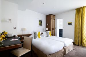 Triple Room room in Hôtel Le Colisée