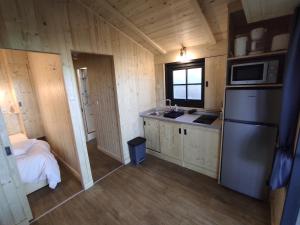 Lacustra Cabanes accessibles en canoe et Chalets tout confort : photos des chambres