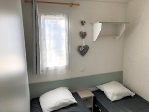 Campings Mobil home 4 personnes proche Parc du PUYDUFOU et du Stade la Beaujoire : photos des chambres