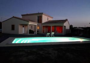 Maisons de vacances Le Chant du Moulin - Maison avec piscine : photos des chambres