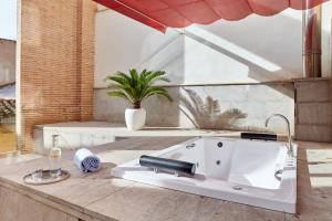 Junior Suite with Terrace and Spa Bath room in Granada Five Senses Rooms & Suites