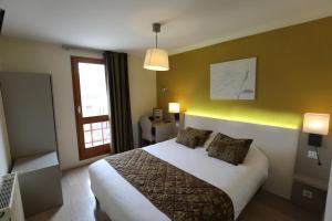 Hotels Logis Le Bourguignon : photos des chambres