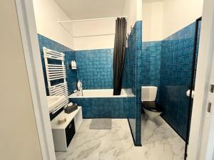 Appartements Central & Cosy : photos des chambres