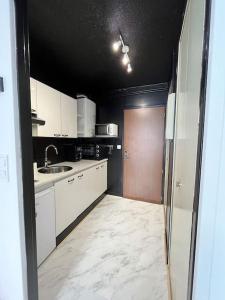 Appartements Central & Cosy : photos des chambres