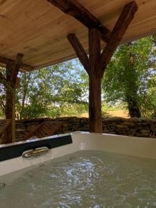 Lodges cabane lodge avec spa privatif : photos des chambres