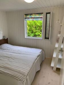 En perle af et sommerhus tæt på både strand og by