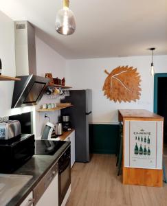 Appartements Groom Epernay - Le Petit Tonnelier : photos des chambres