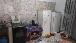 Quarto compartilhado com ar condicionado banheiro externo compartilhado