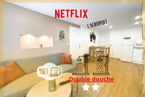 Appartements L'acropole - Douche XXL - Netflix : photos des chambres