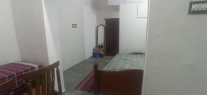 Uthamar Illam