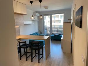 Modern and quiet apartment with air conditioning and private parking