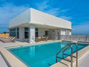 1900 Ninety Eight Condo 702 by Newman-Dailey