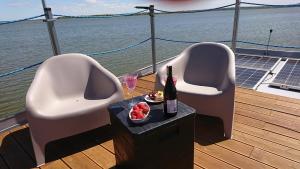 Houseboat Arka 1 - domki na wodzie, rower wodny, Wifi, Parking