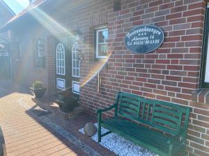 Ferien im Wangerland Ferienwohnung MUSCHEL Minsen Schillig Hund Pool Sauna
