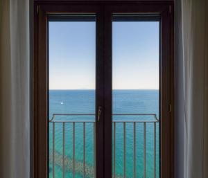 Triple Room with Sea View room in Hotel Sporting