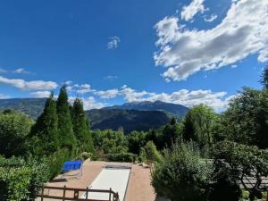 Appartements Gite cosy en montagne avec vue et piscine : photos des chambres