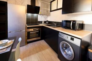 Appartements L'Urbain B - Tout equipe - Centre-Ville Gare : photos des chambres