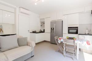 Appartements 2 pieces climatise a 200m des plages : photos des chambres