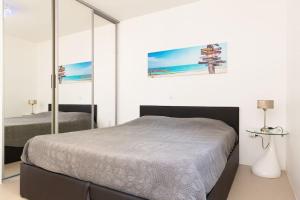 Appartements 2 pieces climatise a 200m des plages : photos des chambres